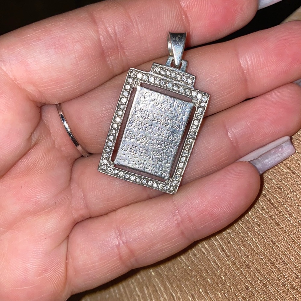 Pendent Arabic writing